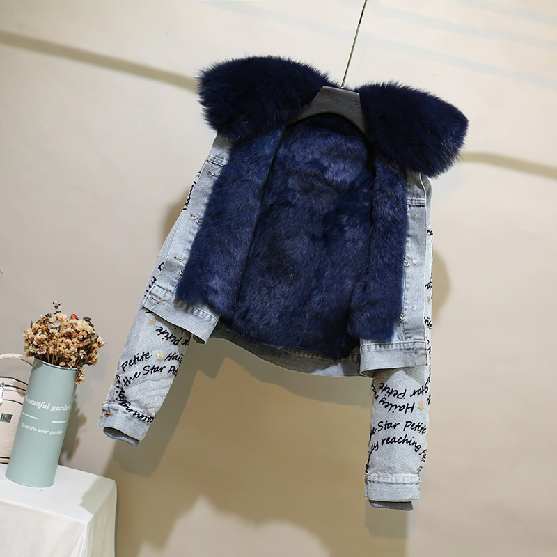 Women's denim parka jacket with beaded embroidery and detachable real fox fur lining, perfect for winter warmth.