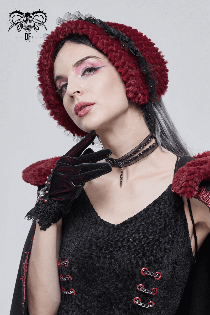 Woman wearing a gothic red faux fur scarf and gloves, showcasing a stylish vintage outfit with lace details.
