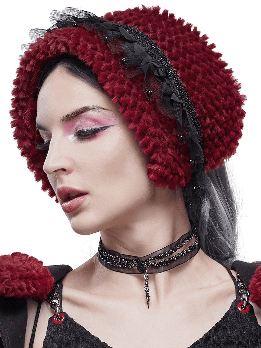 Woman modeling a gothic-style red faux fur scarf with lace, showcasing vintage elegance and unique fashion.