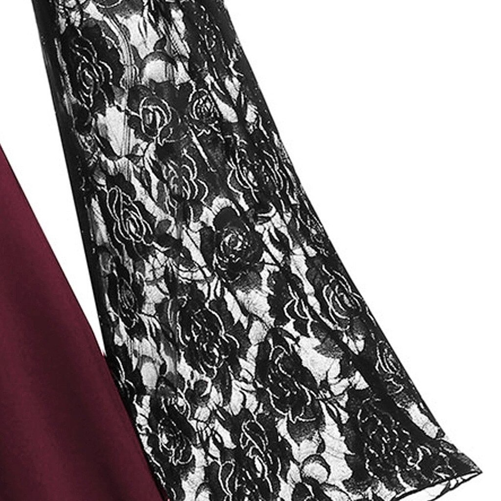 Black lace patchwork sleeve close-up of gothic women's dress, showcasing elegant floral design and vintage flair.