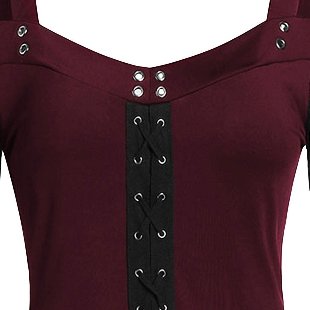 Close-up of gothic women's lace patchwork dress featuring a lace-up design and elegant straps in deep burgundy.