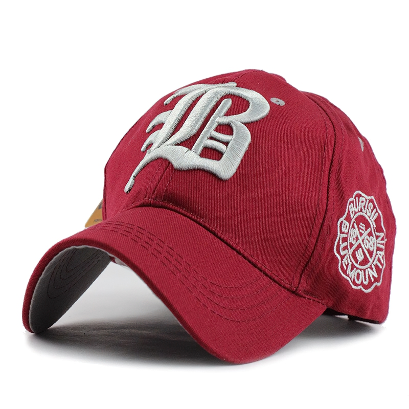 Stylish unisex baseball cap in burgundy with bold letter print and casual design for everyday wear.