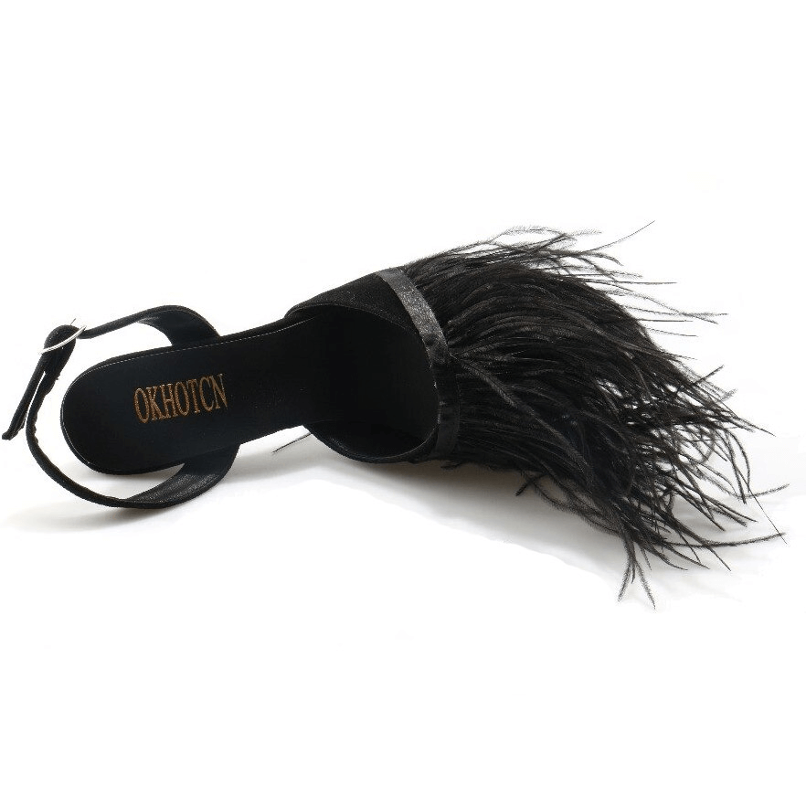 Fashion fringes black flock women's shoes with vintage style and pointed toe design.