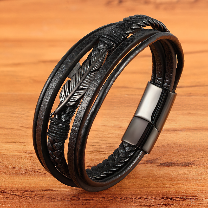 Stylish stainless steel leather bracelet with feather detail, perfect for trendy men and women outfits.