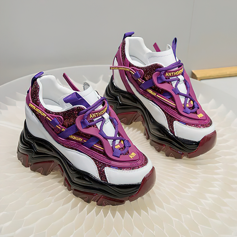 Trendy genuine leather lace-up women's sneakers with chunky platforms and vibrant colors, perfect for casual wear.