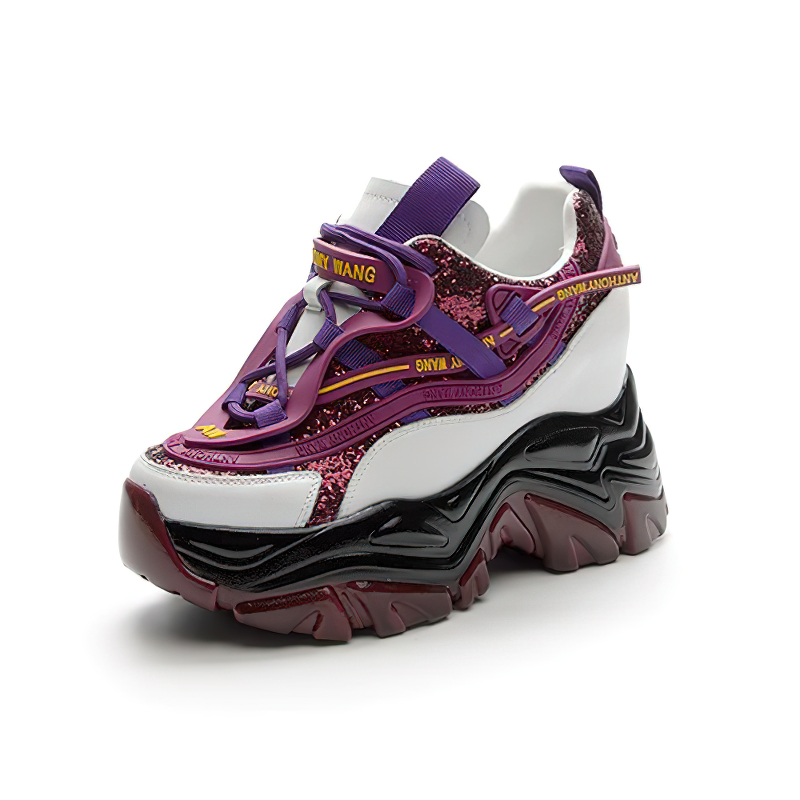 Fashionable chunky platform sneakers in purple and white with lace-up design and stitch details, perfect for casual wear.