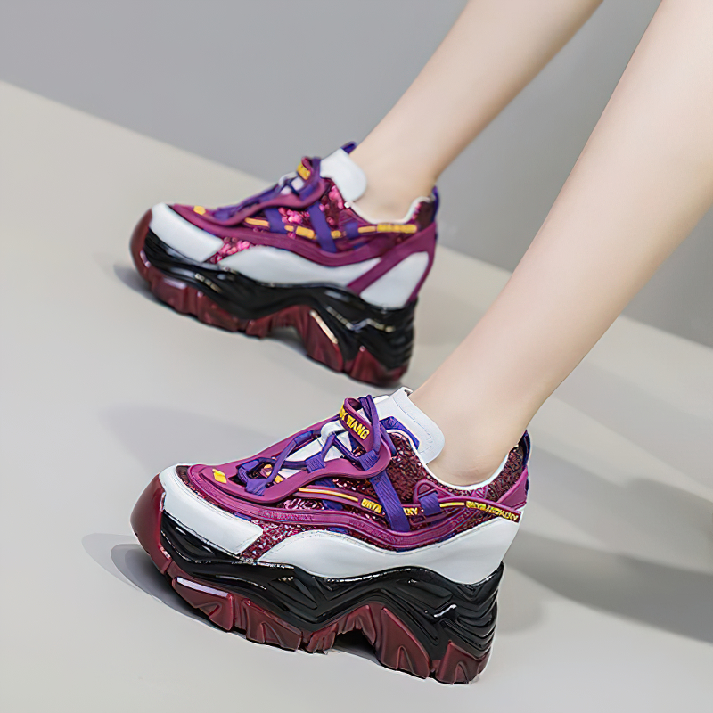 Fashionable genuine leather lace-up women's chunky sneakers with colorful design and platform soles.