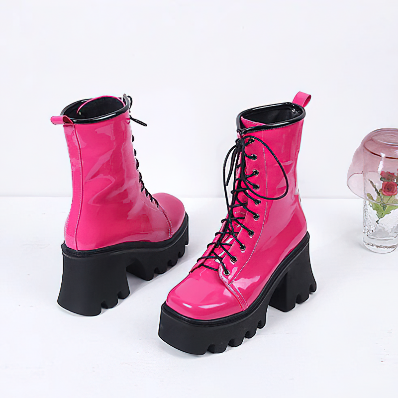 Pink genuine leather platform lace-up ankle boots with tractor sole for women.