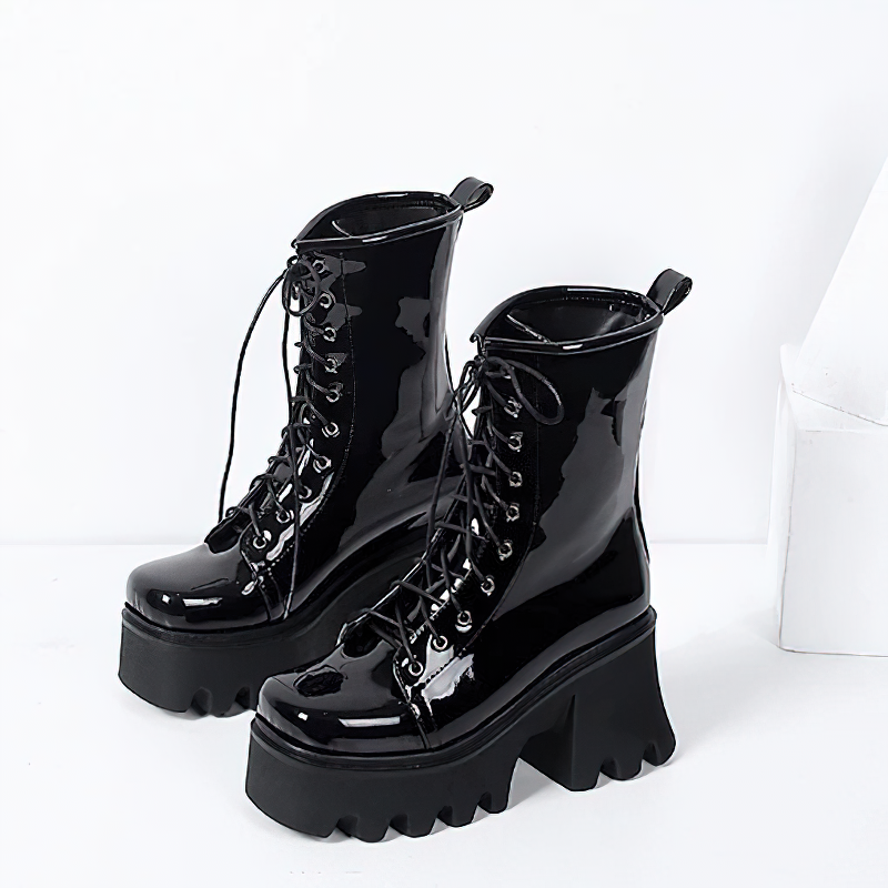 Fashion genuine leather black platform ankle boots with round toe and lace-up detail for women.