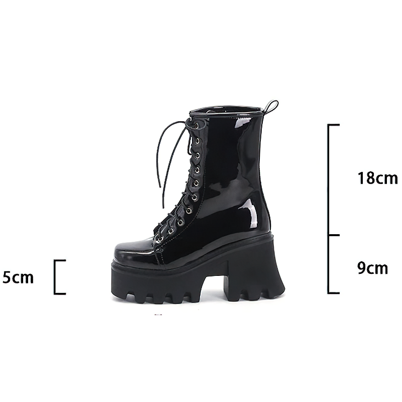 Stylish women's black genuine leather platform ankle boots with round toe, lace-up design, and comfortable tractor sole.
