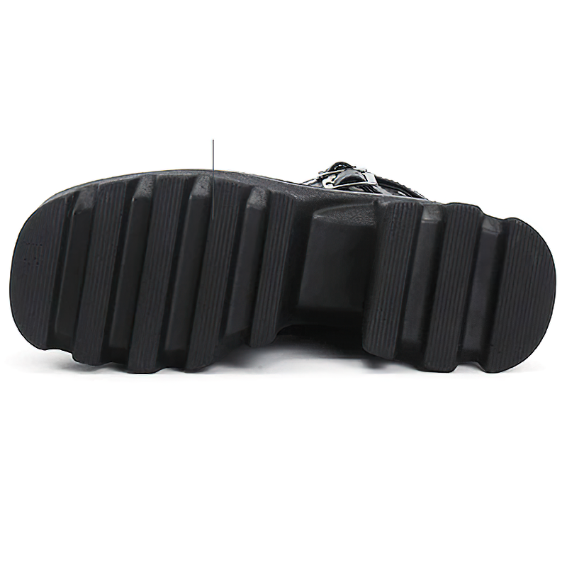 Sole of women's genuine leather platform boots featuring a sturdy tractor design for comfort and style.