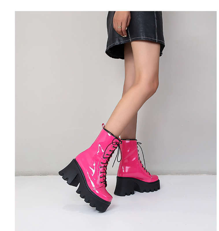 Stylish women's genuine leather platform boots in vibrant pink with lace-up design and comfortable tractor sole.