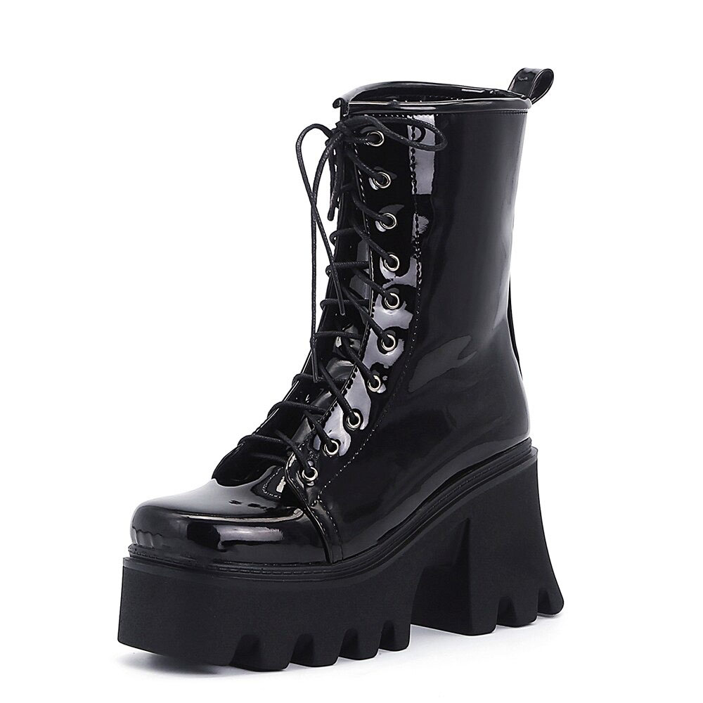 Black genuine leather platform boots for women with round toe and lace-up design, perfect for casual style.