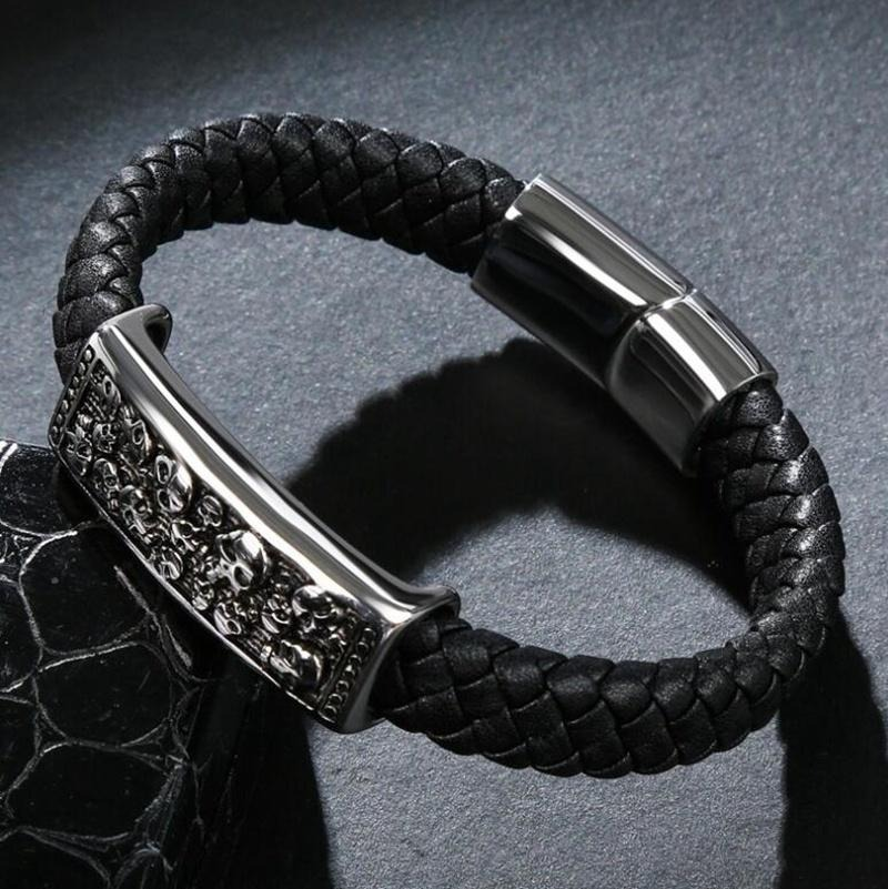 Fashionable men's genuine leather bracelet featuring skulls, perfect for gothic rock punk style jewelry.
