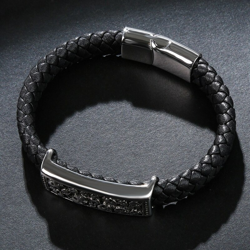 Men's Gothic leather bracelet with skull design, stainless steel clasp, stylish rock punk accessory.