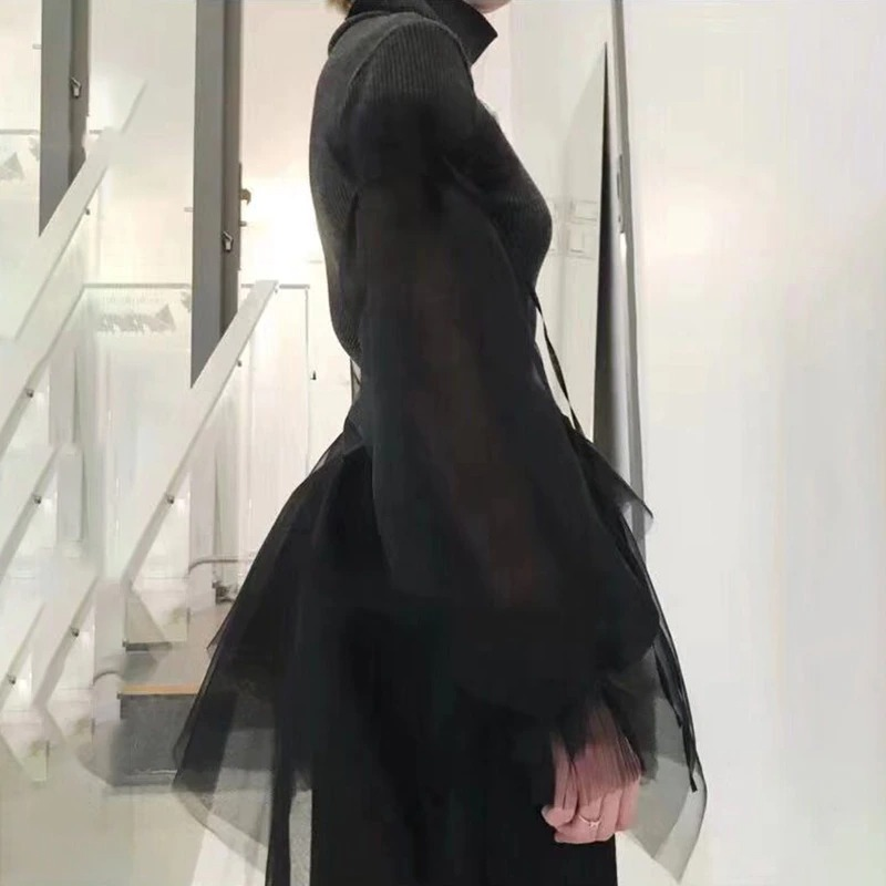 Black gothic turtleneck sweater with long sheer sleeves, perfect for alternative fashion lovers.