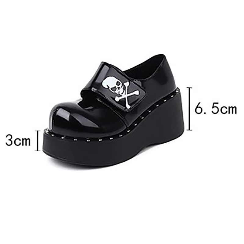 Fashion Gothic platform pumps for women, black patent leather with skull design and velcro strap, height 6.5cm.
