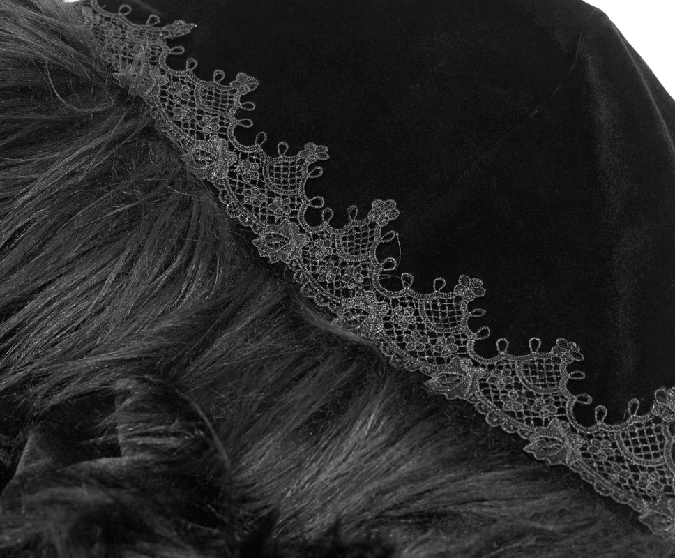 Detail of the black velvet hood with lace trim on a women's gothic cloak, showcasing luxurious texture and style.