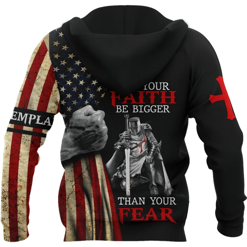 Fashion hoodie featuring American flag, knight, and motivational text about faith over fear.