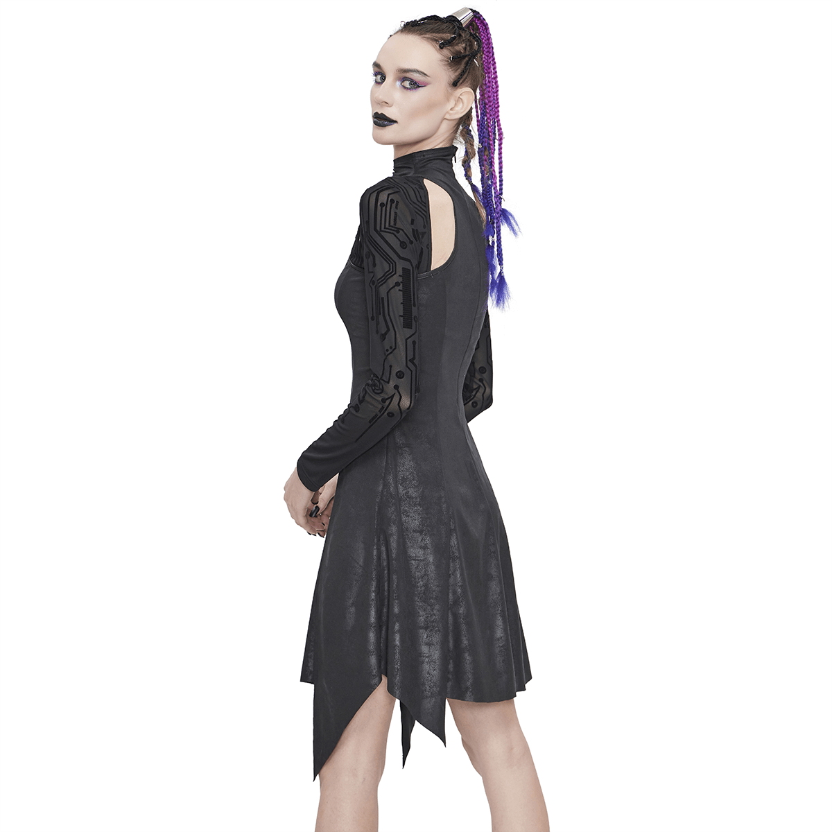 Stylish woman in black irregular hem velvet dress with mesh sleeves, showcasing a unique gothic cyberpunk style.