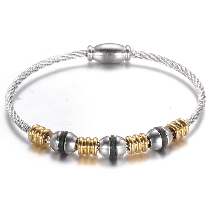 Trendy stainless steel bracelet for women with cool charms in silver and gold, perfect for enhancing your jewelry collection.