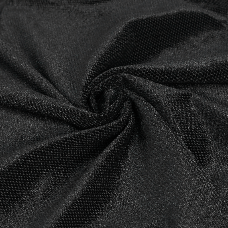 Close-up of luxurious black velvet fabric, ideal for gothic style flare trousers.