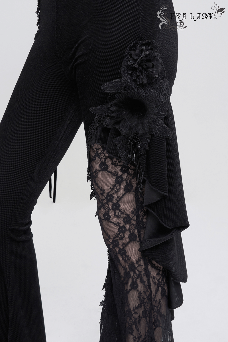 Close-up of women's gothic velvet flare trousers featuring lace accents and floral details on the side, perfect for a stylish gothic look.