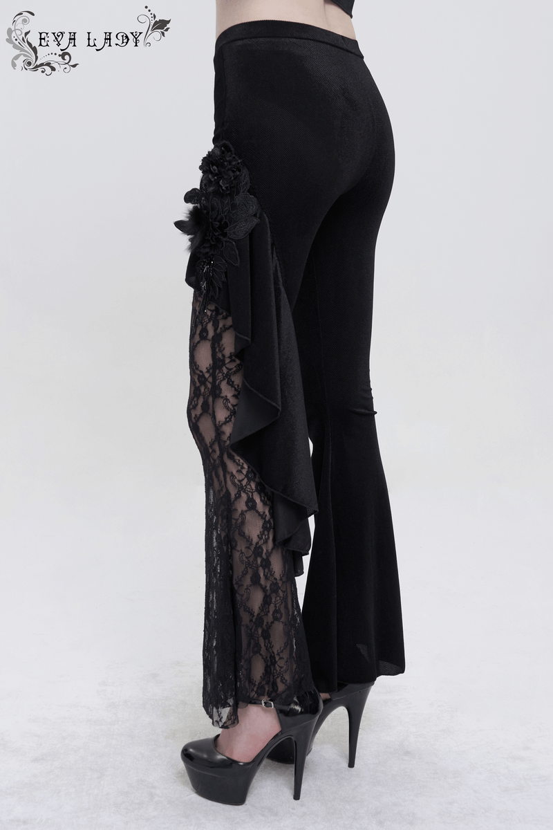 Women's black velvet flare pants featuring lace accents and floral details, perfect for gothic style enthusiasts.