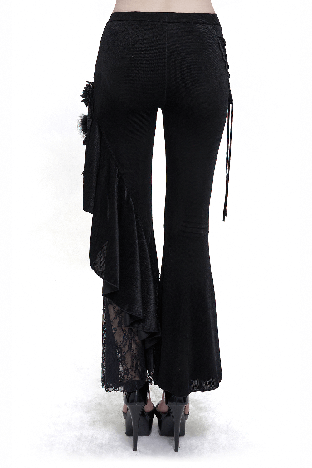 Women’s gothic velvet lace flare pants with lace-up accents and ruffled details on the side, perfect for a stylish look.