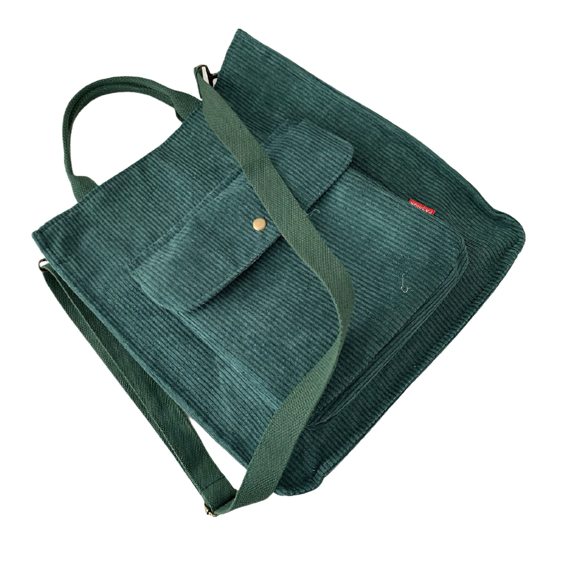 Fashion ladies corduroy handbag in dark green with a front pocket, perfect for casual outings and study.