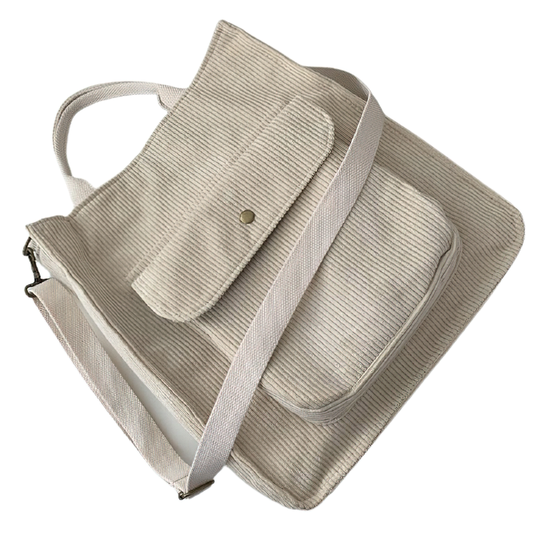 Fashion ladies corduroy handbag in beige, casual tote bag design with spacious compartments and adjustable strap.