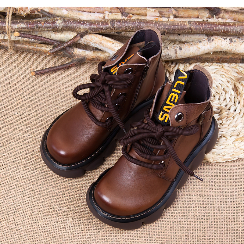 Brown casual leather ankle boots with thick platforms, perfect for women's stylish wardrobe.