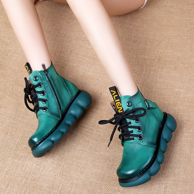 Teal fashion ladies leather ankle boots with thick platform and lace-up style, perfect for casual outfits.