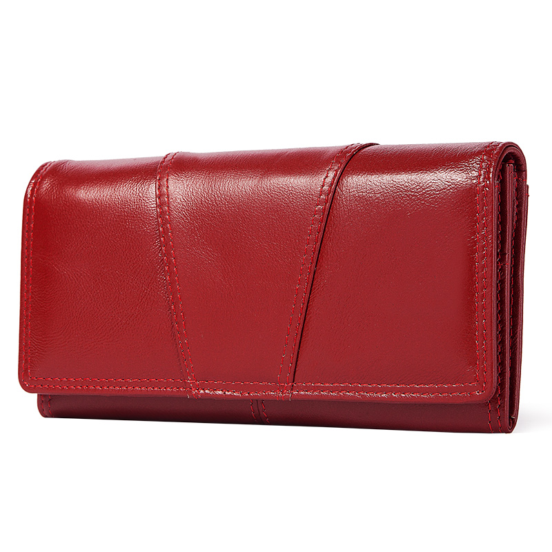 Trendy red genuine leather long wallet clutch with card case and hasp for fashionable ladies.