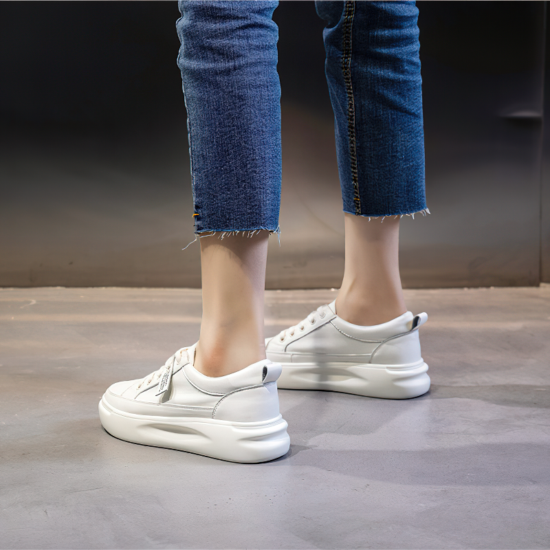 Stylish lace-up genuine leather sneakers for women in white, perfect for casual outfits with a comfortable 3-5cm platform.