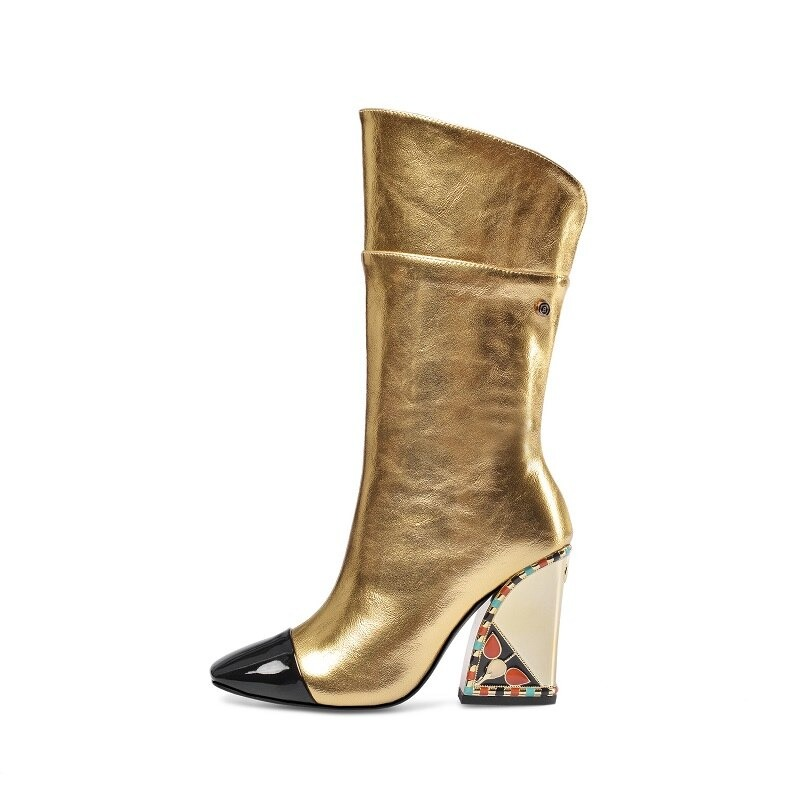 Fashion ladies mid-calf golden leather boots with stylish block heels and black toe for a chic look.