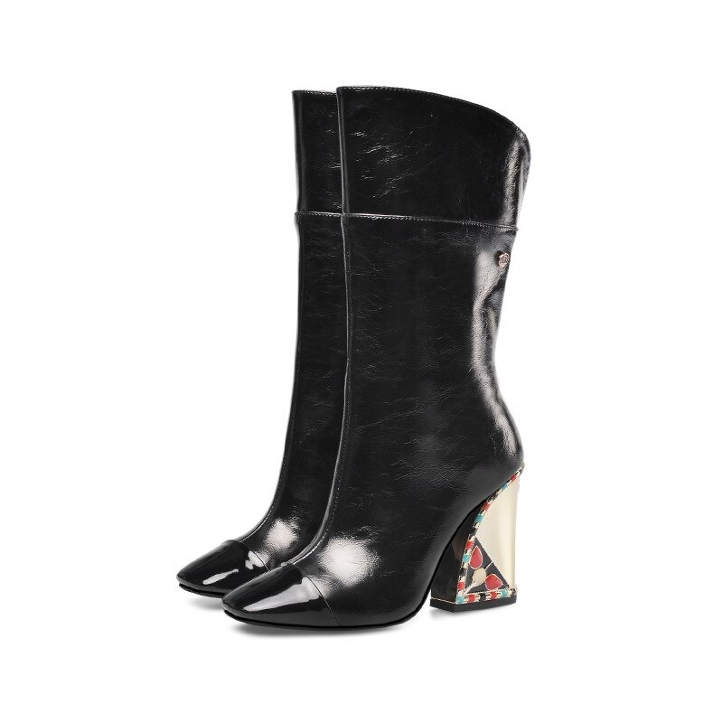 Fashion ladies mid-calf boots in black leather with a stylish embroidered heel, perfect for trendy outfits.