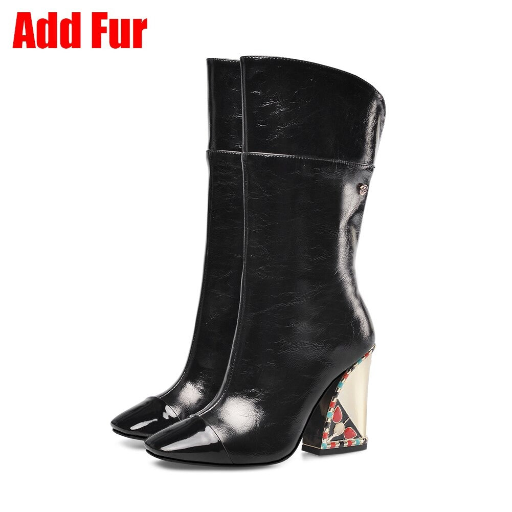 Fashionable black mid-calf boots with unique patterned heel and glossy finish, perfect for stylish women.