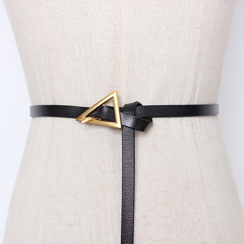 Elegant black PU leather belt with a stylish metal triangle buckle for chic fashion looks.