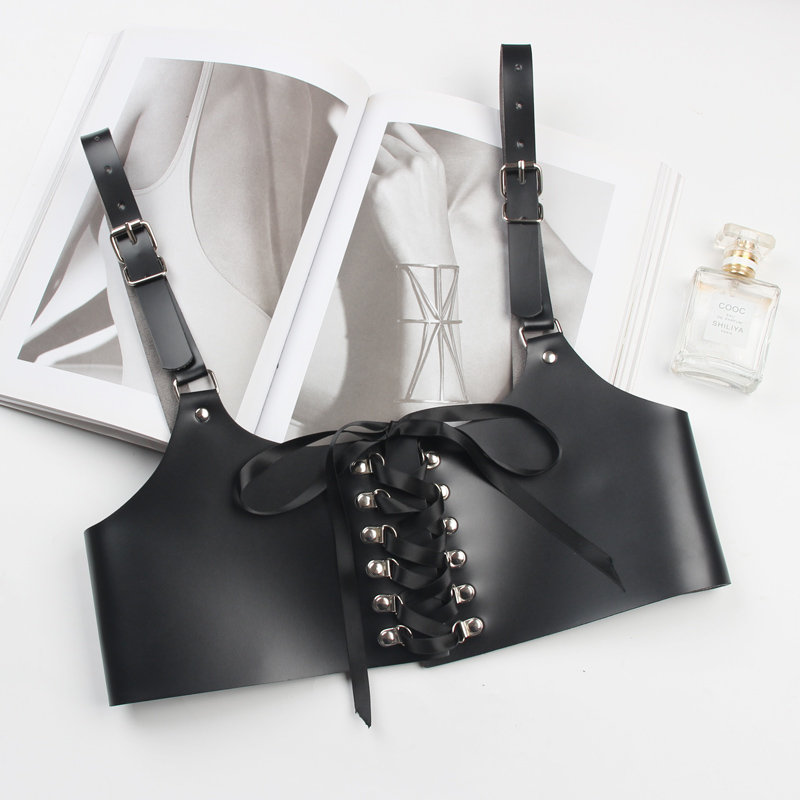 Fashionable black PU leather corset with lace-up front and adjustable straps, perfect for edgy and alternative outfits.