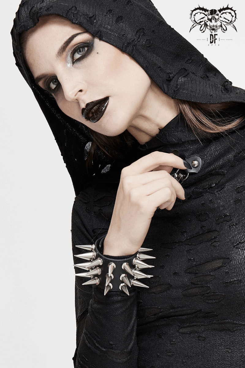Model showcasing a punk unisex fashion leather bracelet with spikes, exuding edgy style and confidence.