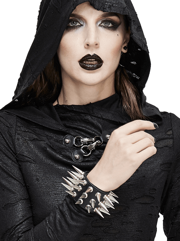 Stylish unisex punk bracelet with silver spikes worn by model in black attire, perfect for edgy outfits.