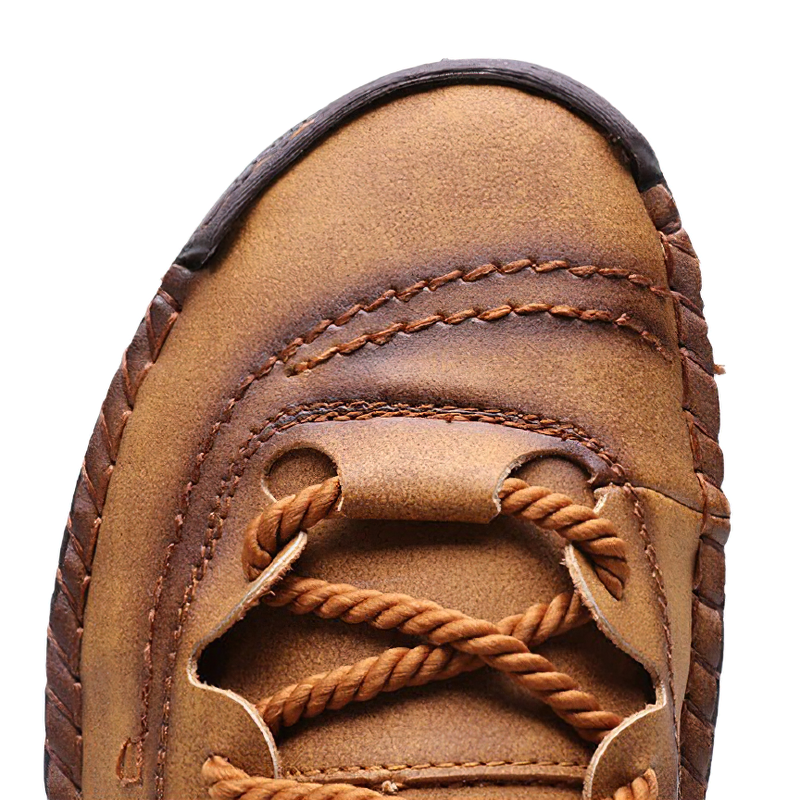 Close-up of stylish men's casual loafers made of genuine leather in rich brown color.