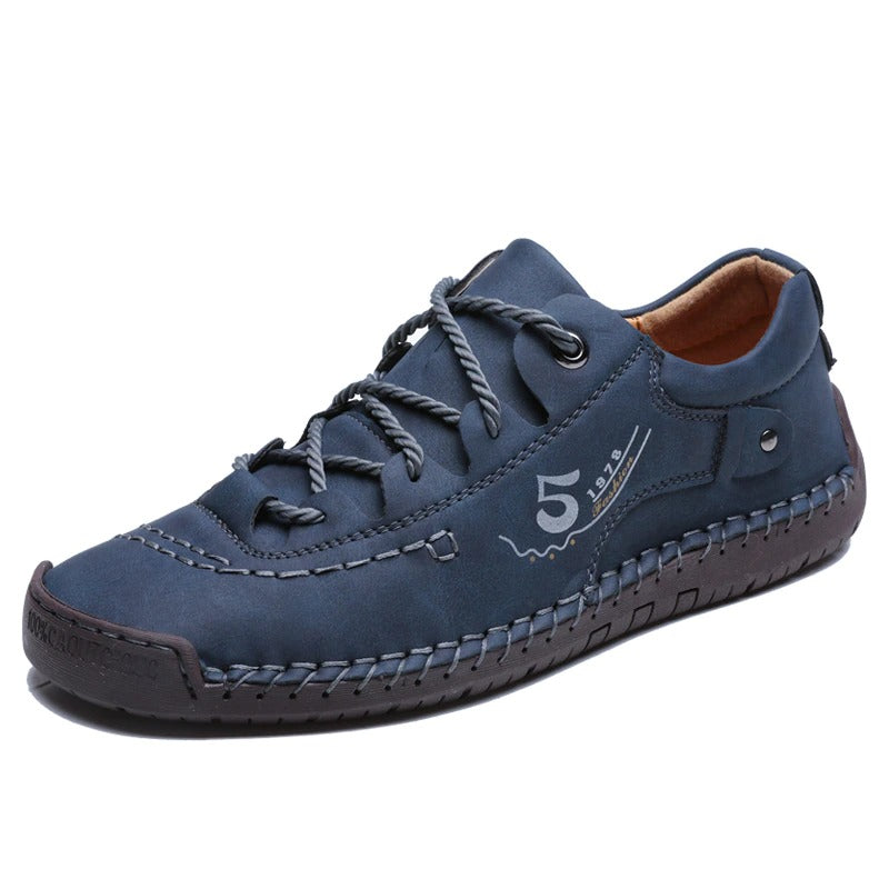 Stylish men's navy loafers with lace-up design, perfect for casual outings and breathable comfort.