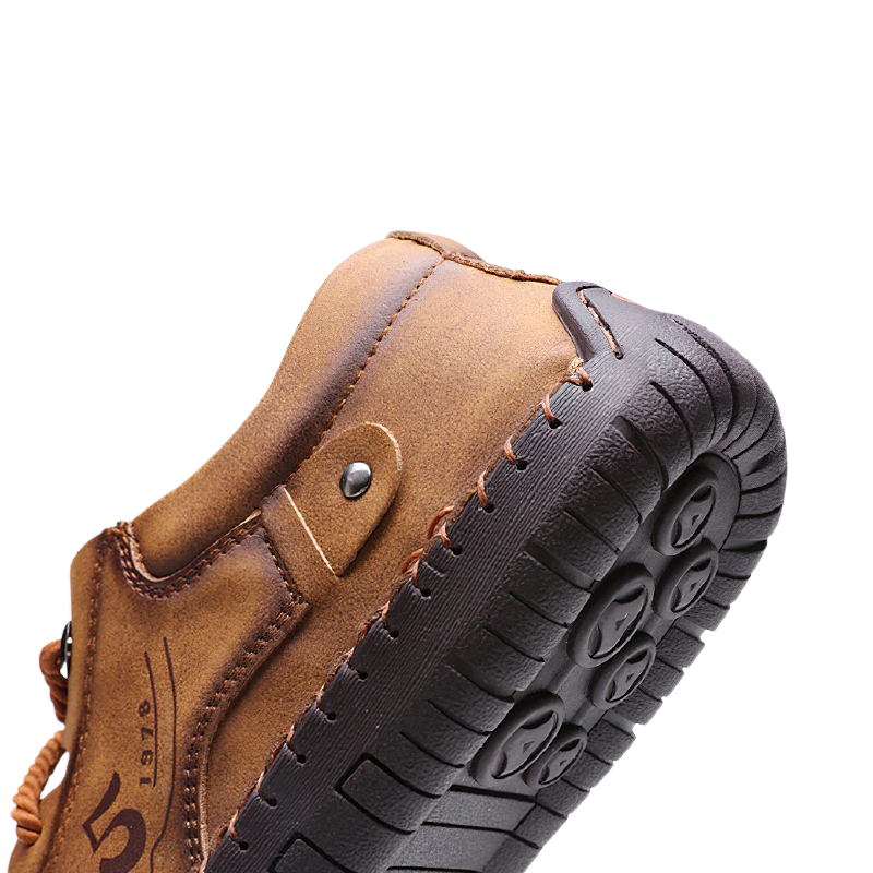 Stylish men's casual loafers in brown leather showcasing detailed stitching and durable sole design.