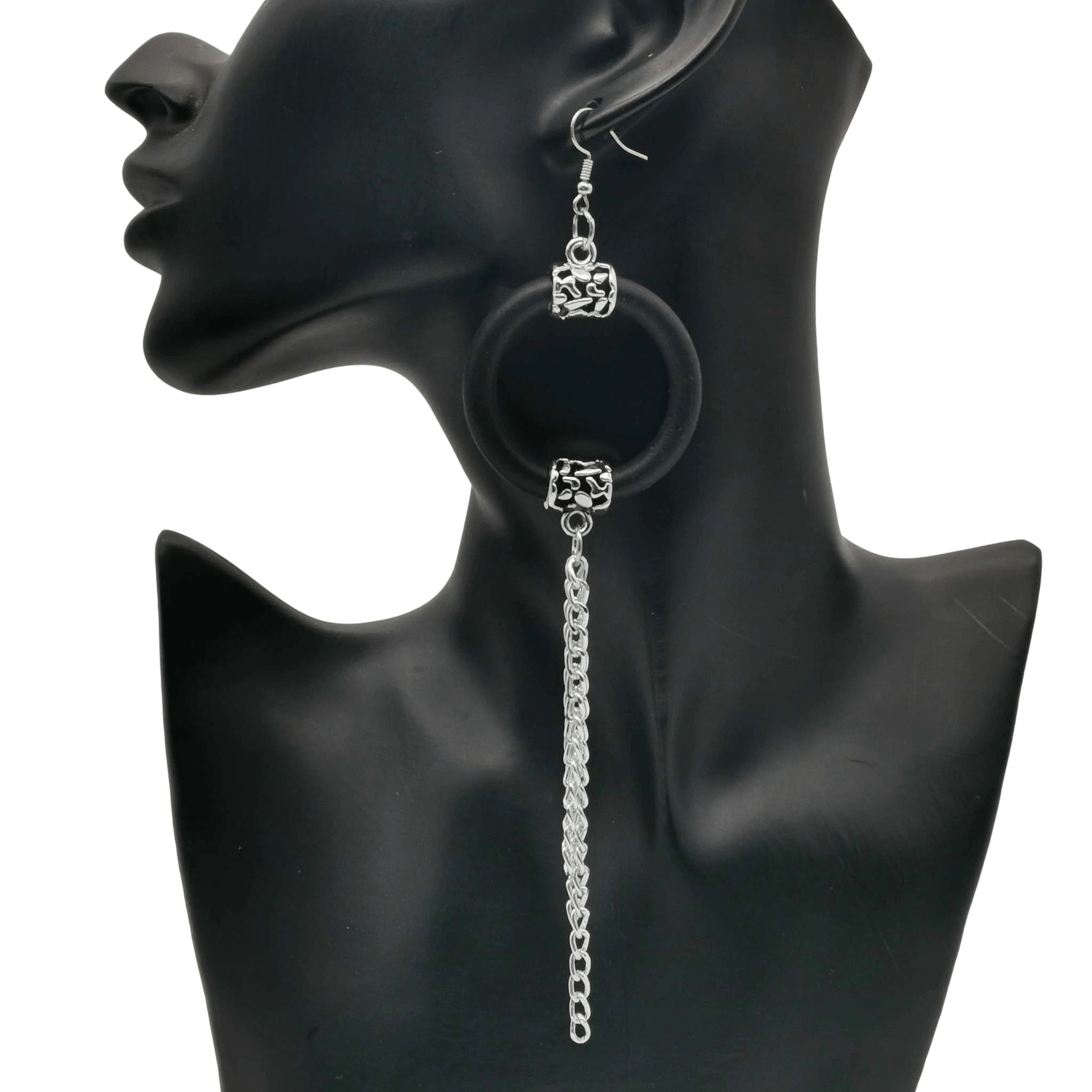 Handmade women's long rubber drop earrings with silver accents, perfect for boho style outfits.