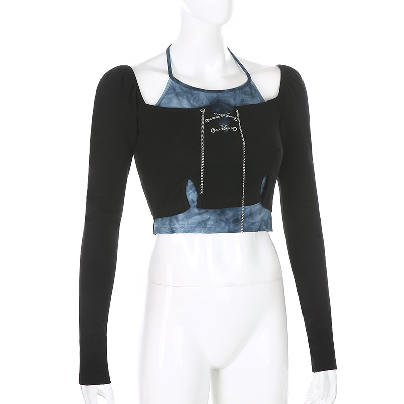 Fashionable black crop top with long sleeves and blue tie-dye accents, featuring silver chain detail for a gothic look.