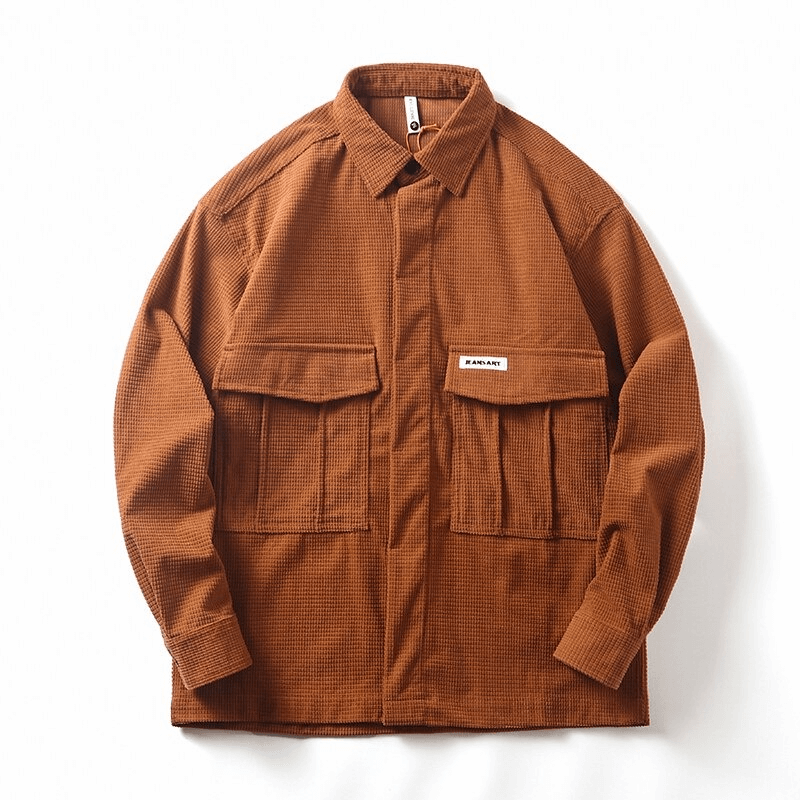 Men's oversized brown shirt with two big front pockets, perfect for alternative style wardrobes.