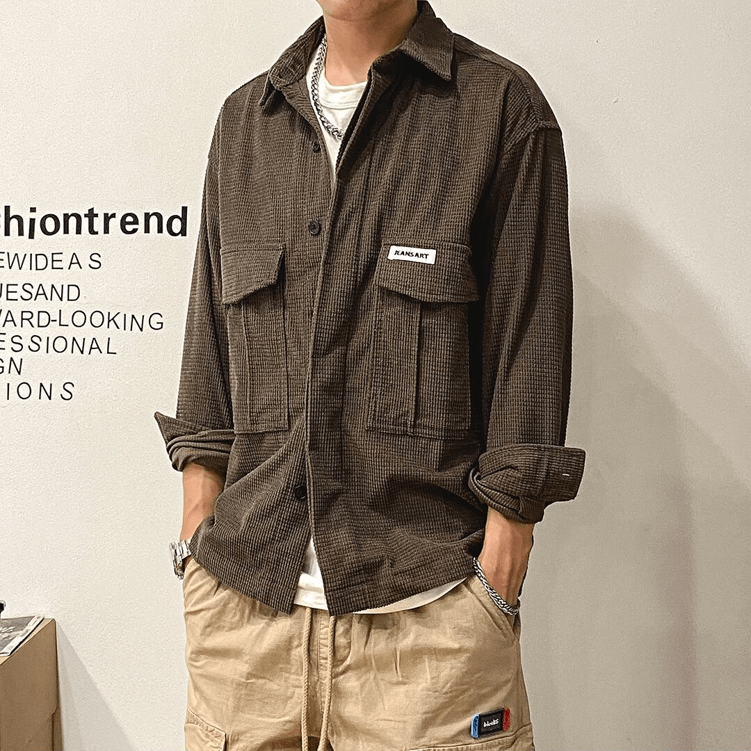 Men's oversized long sleeve shirt with two big pockets in alternative style, perfect for a trendy wardrobe.
