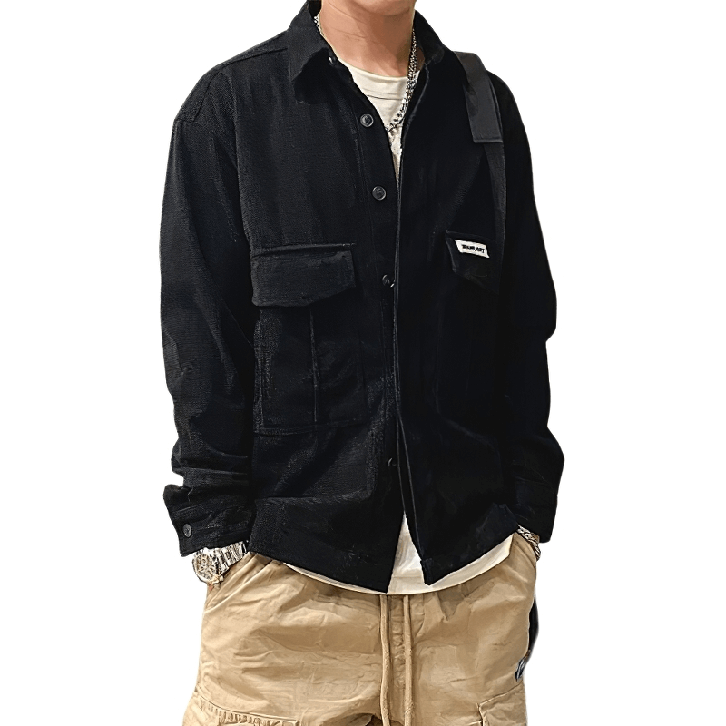 Men's oversized black shirt with two big pockets, featuring an alternative style perfect for casual outfits.